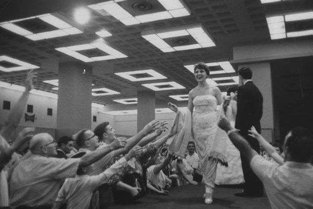 "Soviet fashion model in a fashion show at the Soviet exhibition," 1959